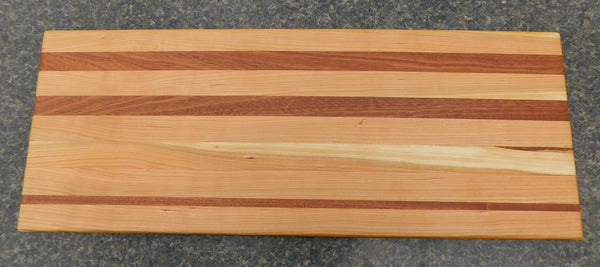 Cherry Wood & Mahogany Hardwood Edge Grain Cutting Board. Handmade in the USA using locally sourced hardwood.