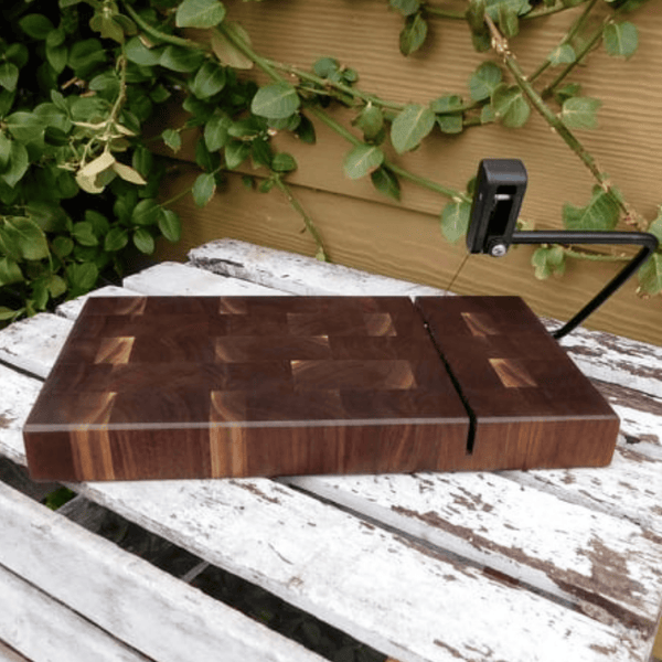 Black Walnut end grain wooden cheese slicing cutting board.