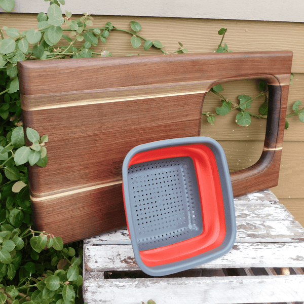 Large Over The Sink Black Walnut Edge Grain Cutting Board with Colander and Clear Rubber Grip Feet
