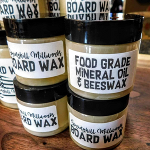 Cutting and charcuterie board wax made from food grade bees wax and mineral oil.