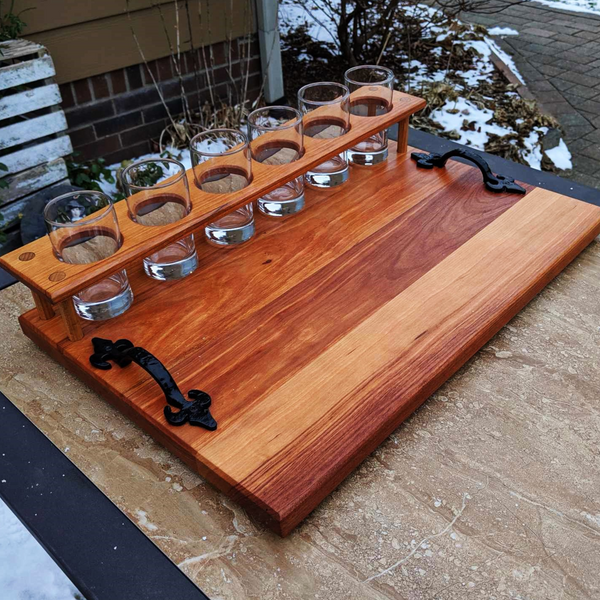 Spalted Cherry Wood Beer Flight Charcuterie Board with 5.5 oz. Taster Glasses, Stainless Steel Sauce Cups, Cast Iron Handles, & Clear Rubber Grip Feet