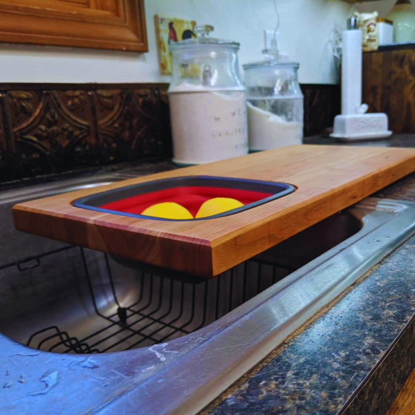 Over the Sink Cherry Wood Edge Grain Cutting Board with Colander and Clear Rubber Grip Feet