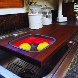 Large Over The Sink Black Walnut Edge Grain Cutting Board with Colander and Clear Rubber Grip Feet