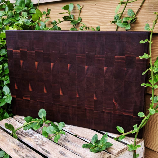 Large Black Walnut End Grain Cutting Board with Hand Grooves and a Beveled Edge.