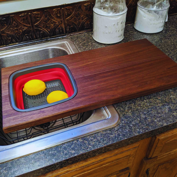 Large Over The Sink Black Walnut Edge Grain Cutting Board with Colander and Clear Rubber Grip Feet