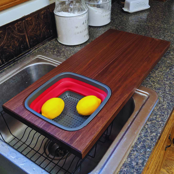 Large Over The Sink Black Walnut Edge Grain Cutting Board with Colander and Clear Rubber Grip Feet