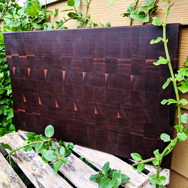 Large Black Walnut End Grain Cutting Board with Hand Grooves and a Beveled Edge.