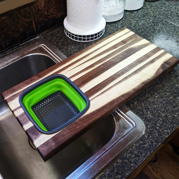 Large Over The Sink Black Walnut Edge Grain Cutting Board with Colander and Clear Rubber Grip Feet