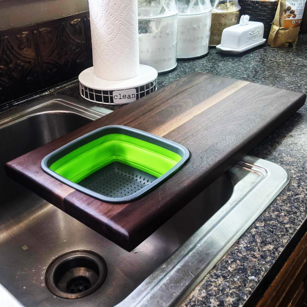 Over The Sink Black Walnut Edge Grain Cutting Board with Colander and Clear Rubber Grip Feet