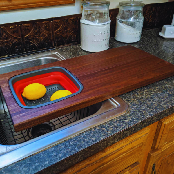 Large Over The Sink Black Walnut Edge Grain Cutting Board with Colander and Clear Rubber Grip Feet