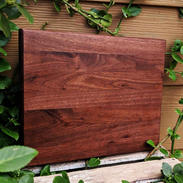 Black Walnut Wood Edge Grain Cutting Board with Beveled Edge & Rubber Grip Feet.