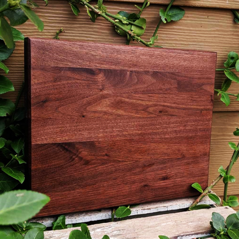 Black Walnut Wood Edge Grain Cutting Board with Beveled Edge & Rubber Grip Feet.