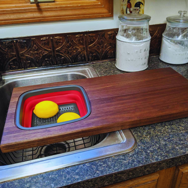 Large Over The Sink Black Walnut Edge Grain Cutting Board with Colander and Clear Rubber Grip Feet