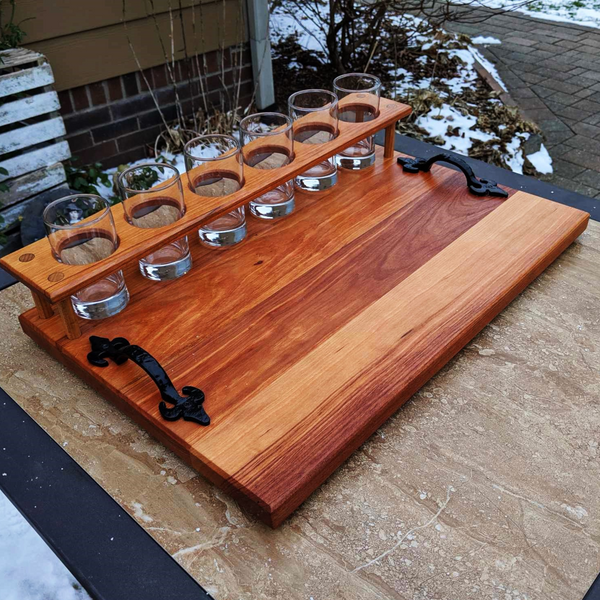 Spalted Cherry Wood Beer Flight Charcuterie Board with 5.5 oz. Taster Glasses, Stainless Steel Sauce Cups, Cast Iron Handles, & Clear Rubber Grip Feet