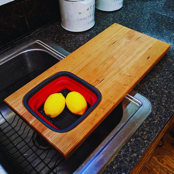 Over the Sink Cherry Wood Edge Grain Cutting Board with Colander and Clear Rubber Grip Feet