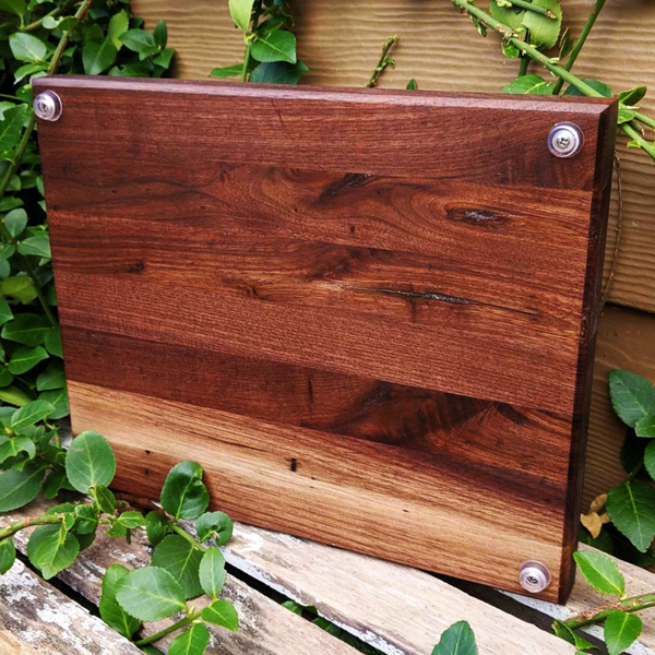 Black Walnut Wood Edge Grain Cutting Board with Beveled Edge & Rubber Grip Feet.