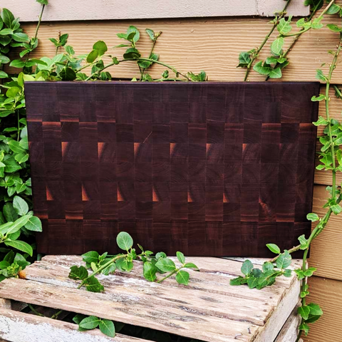 Large Black Walnut End Grain Cutting Board with Hand Grooves and a Beveled Edge.