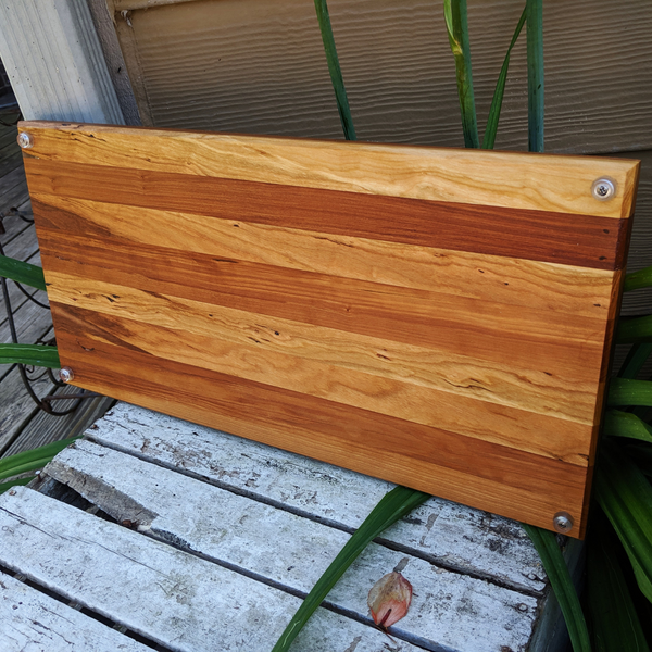 Handmade spalted cherry wood serving tray styled with cheese and appetizers