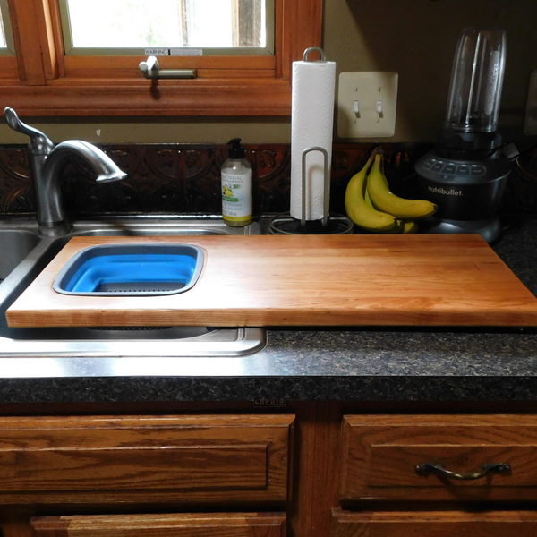 Extra Large Over The Sink Cherry Wood Edge Grain Cutting Board with Collapsible Colander and Clear Rubber Grip Feet