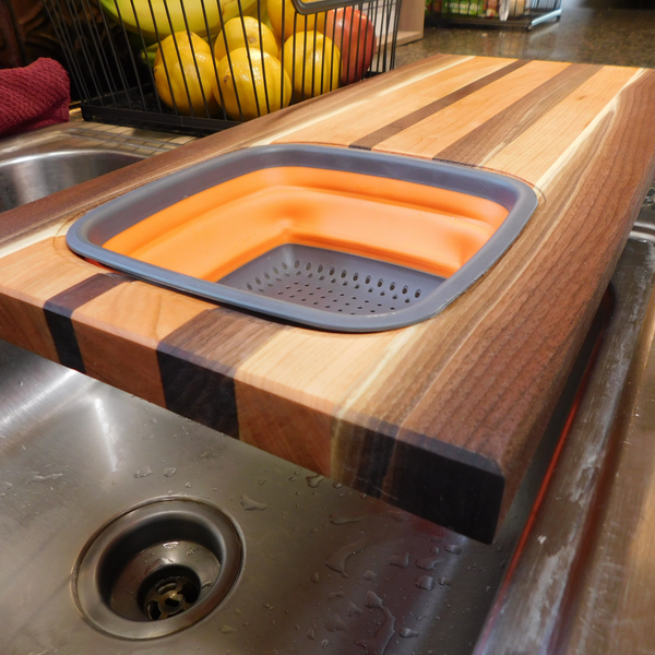 Large Over The Sink Black Walnut & Cherry Wood Edge Grain Cutting Board with Colander and Clear Rubber Grip Feet