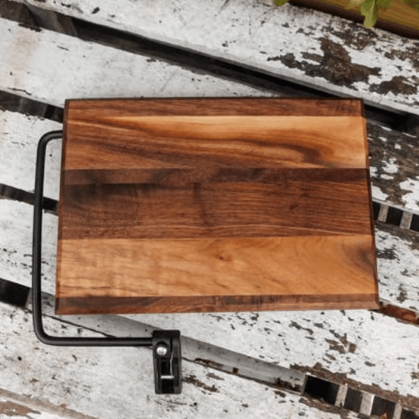Butcher block Walnut cheese slicing board, finished in a food grade oil and beeswax mixture.