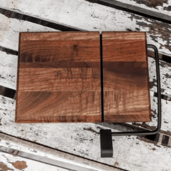 Butcher block Walnut cheese slicing board, finished in a food grade oil and beeswax mixture.