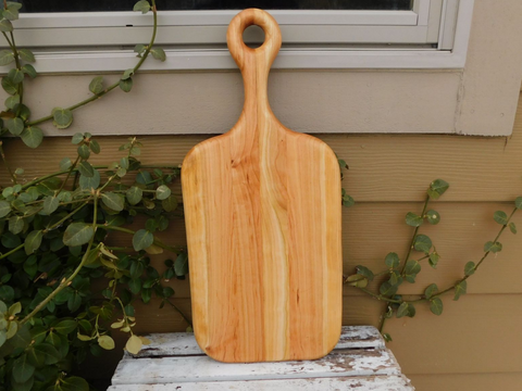 Cherry Wood charcuterie board with handle. Handmade in the USA by Springhill Millworks.