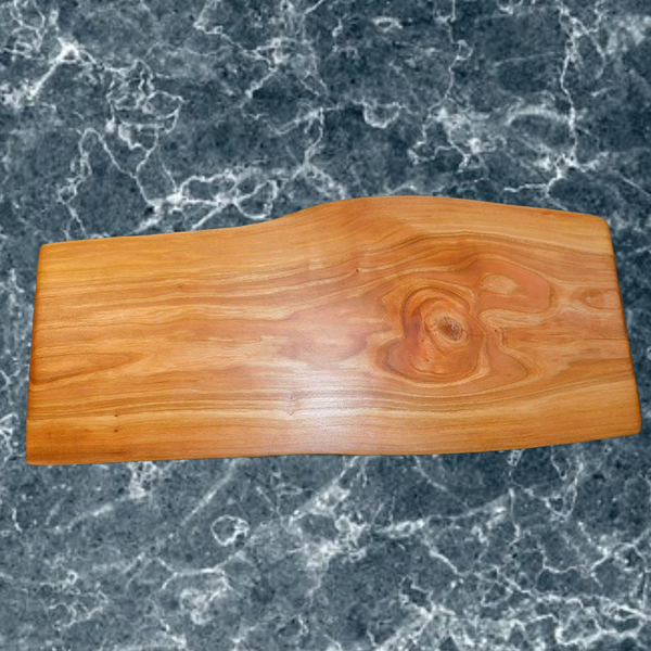 Cherry Wood live edge charcuterie board. Handmade in the USA by Springhill Millworks.