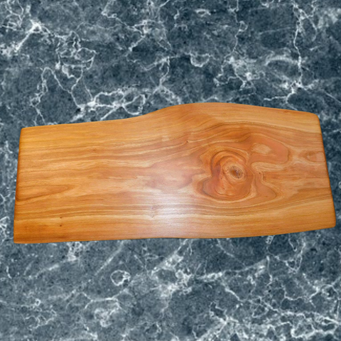 Cherry Wood live edge charcuterie board. Handmade in the USA by Springhill Millworks.