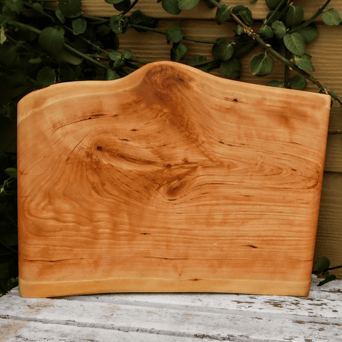 Cherry Wood charcuterie board finished in a food grade oil and beeswax mixture.