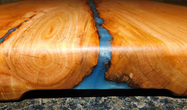 Cherry Wood live edge charcuterie river board. Handcrafted in the USA by Springhill Millworks.