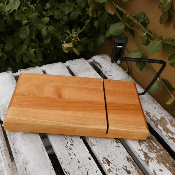 Cheery Wood butcher block cheese cutting board.