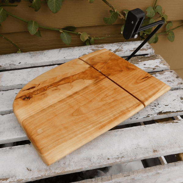 Cherry Wood cheese slicing board.