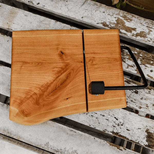 Cherry Wood cheese cutting board, finished in a food grade oil and beeswax mixture.