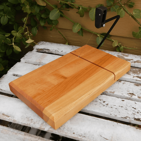 Cheery Wood butcher block cheese cutting board.