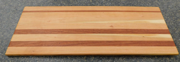 Cherry Wood & Mahogany Hardwood Edge Grain Cutting Board. Handmade in the USA using locally sourced hardwood.