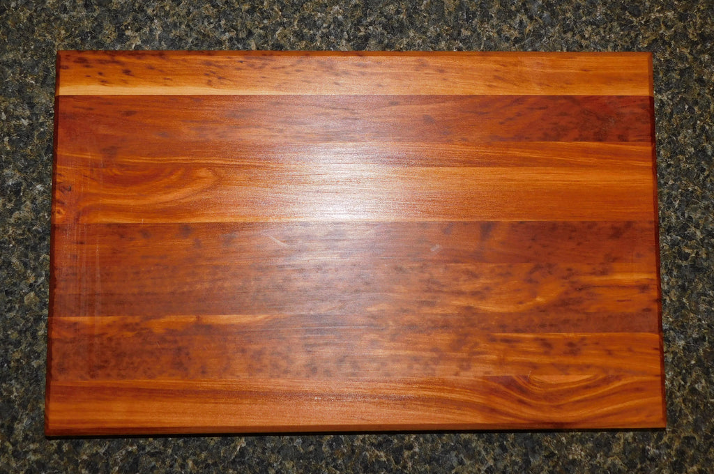 https://springhillmillworks.com/cdn/shop/products/CherrywoodEdgeGrainCuttingBoard_65ae7162-85b2-43c1-8bd5-6d35685c36fb_1024x1024.jpg?v=1637689986