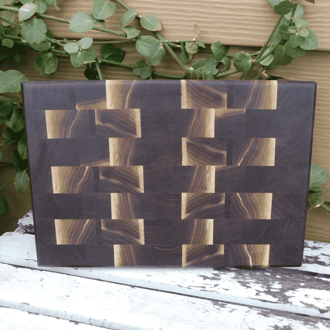 Black Walnut end grain cutting board with beveled edge, finished in a food grade oil and beeswax mixture. Handmade in the USA by Springhill Millworks.
