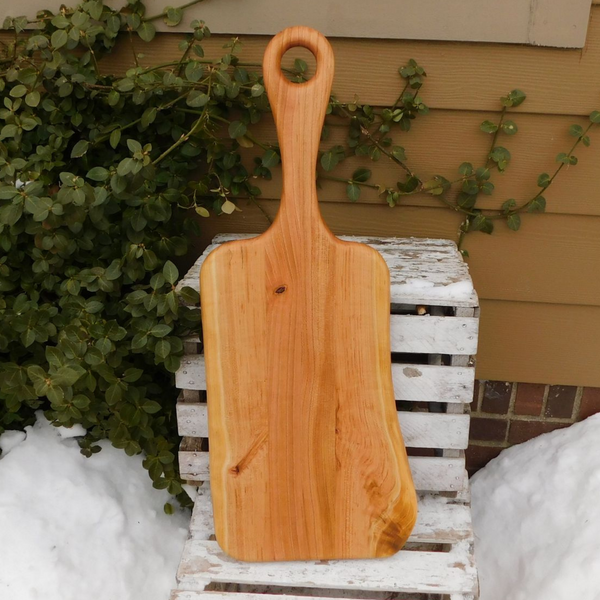 Cherry Wood charcuterie board with handle. Handmade in the USA by Springhill Millworks.