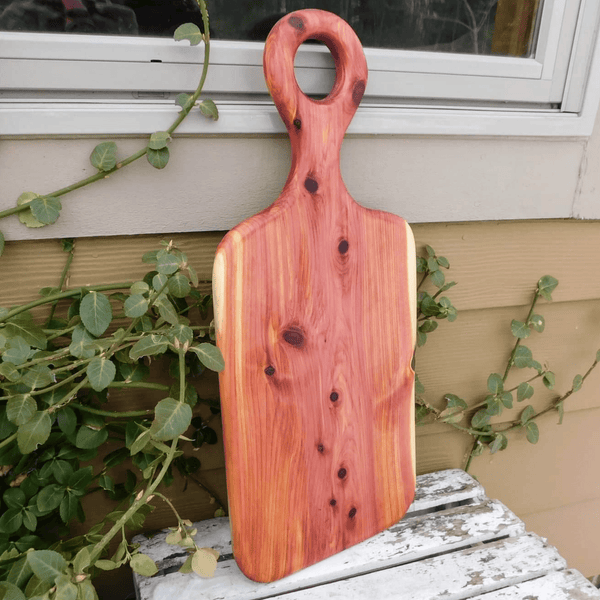 Cedar charcuterie board with handle finished in a food grade beeswax and oil mixture. Handmade in the USA by Springhill Millworks.