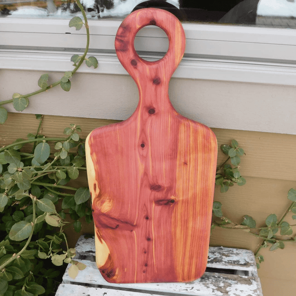 Cedar charcuterie board with handle finished in a food grade beeswax and oil mixture. Handmade in the USA by Springhill Millworks.