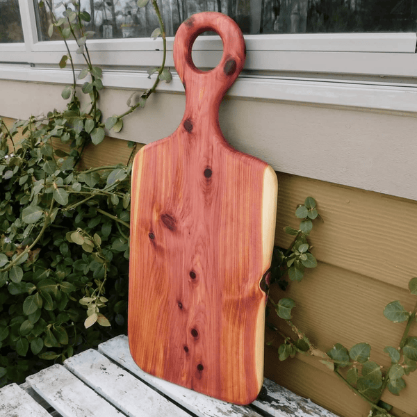 Cedar charcuterie board with handle finished in a food grade beeswax and oil mixture. Handmade in the USA by Springhill Millworks.