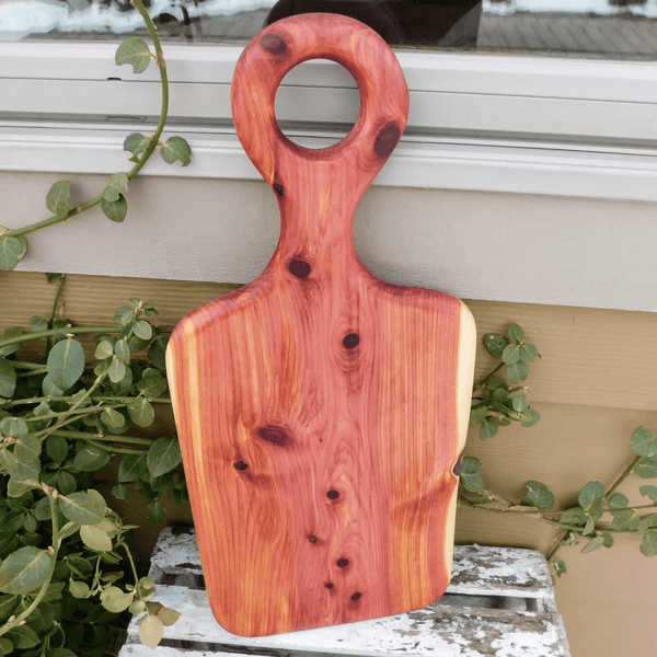 Cedar charcuterie board with handle finished in a food grade beeswax and oil mixture. Handmade in the USA by Springhill Millworks.