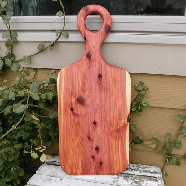 Cedar charcuterie board with handle finished in a food grade beeswax and oil mixture. Handmade in the USA by Springhill Millworks.