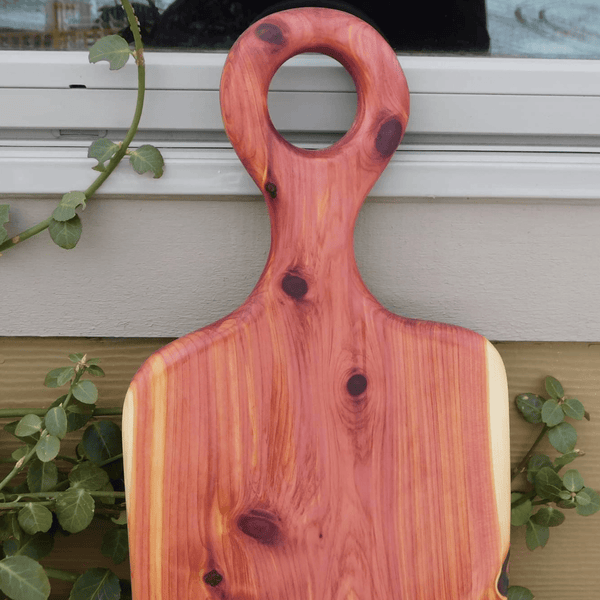 Cedar charcuterie board with handle finished in a food grade beeswax and oil mixture. Handmade in the USA by Springhill Millworks.