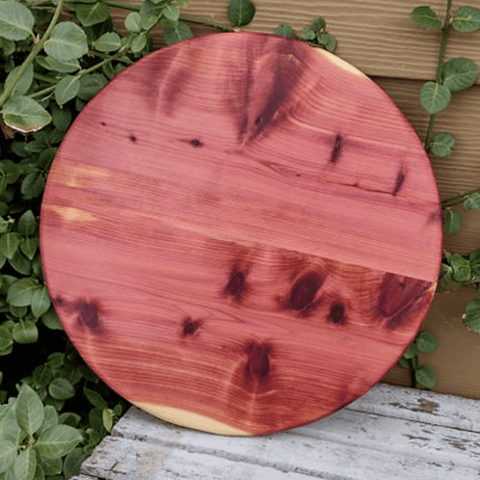 Red Cedar wood lazy susan with clear rubber grip feet.