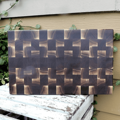Black Walnut end grain cutting board with beveled edge, finished in a food grade oil and beeswax mixture.