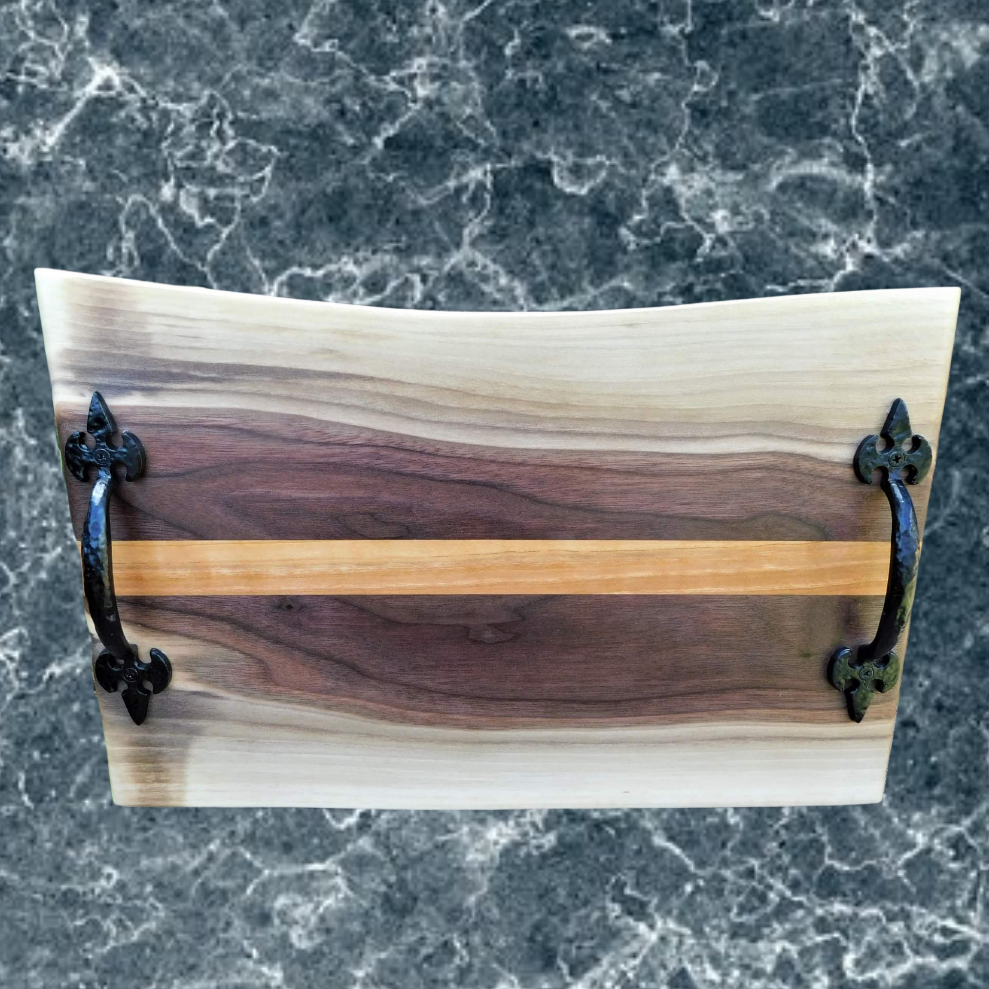 Black Walnut Charcuterie Board with Cherry Wood Accent Stripe, Wrought Iron Handles, & Clear Rubber Grip Feet